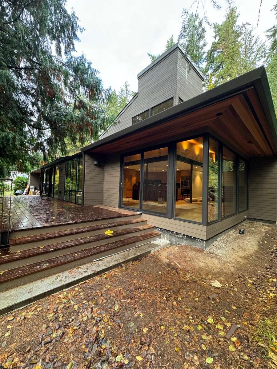 Deck and siding on a wooded Eastside home