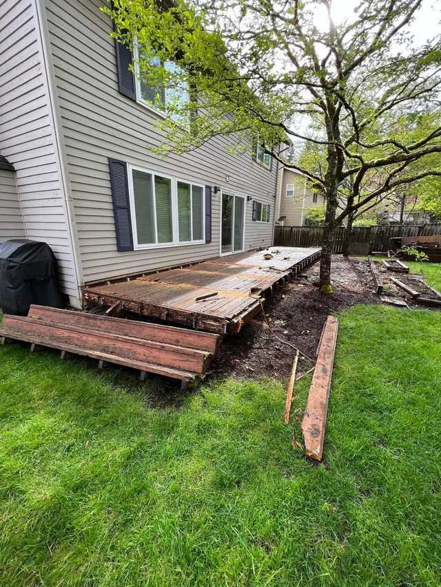 Composite deck rebuild framed around trees